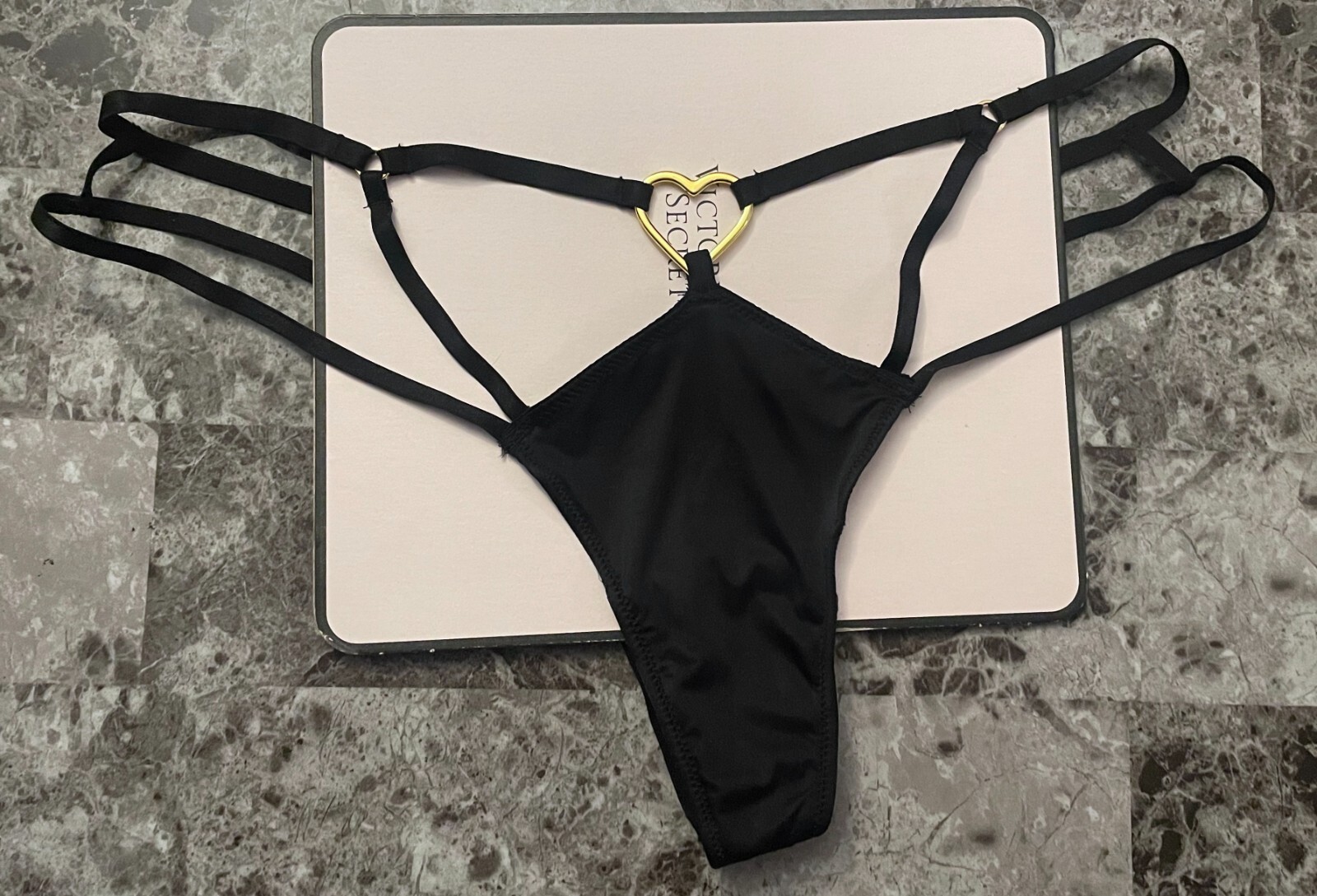 NWT VICTORIA’S SECRET BLACK SATIN SMOOTH STRAPPY HEART HARDWARE THONG PANTIES