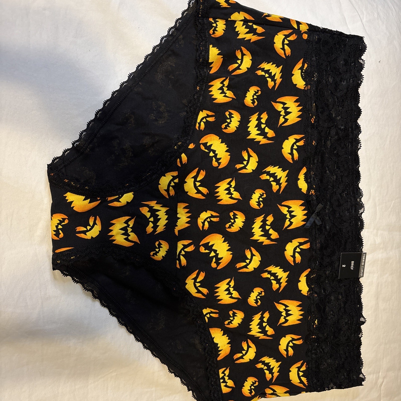 NWT TORRID Brief Pantie Sz 2 Black Orange Pumpkins Lace Jersey